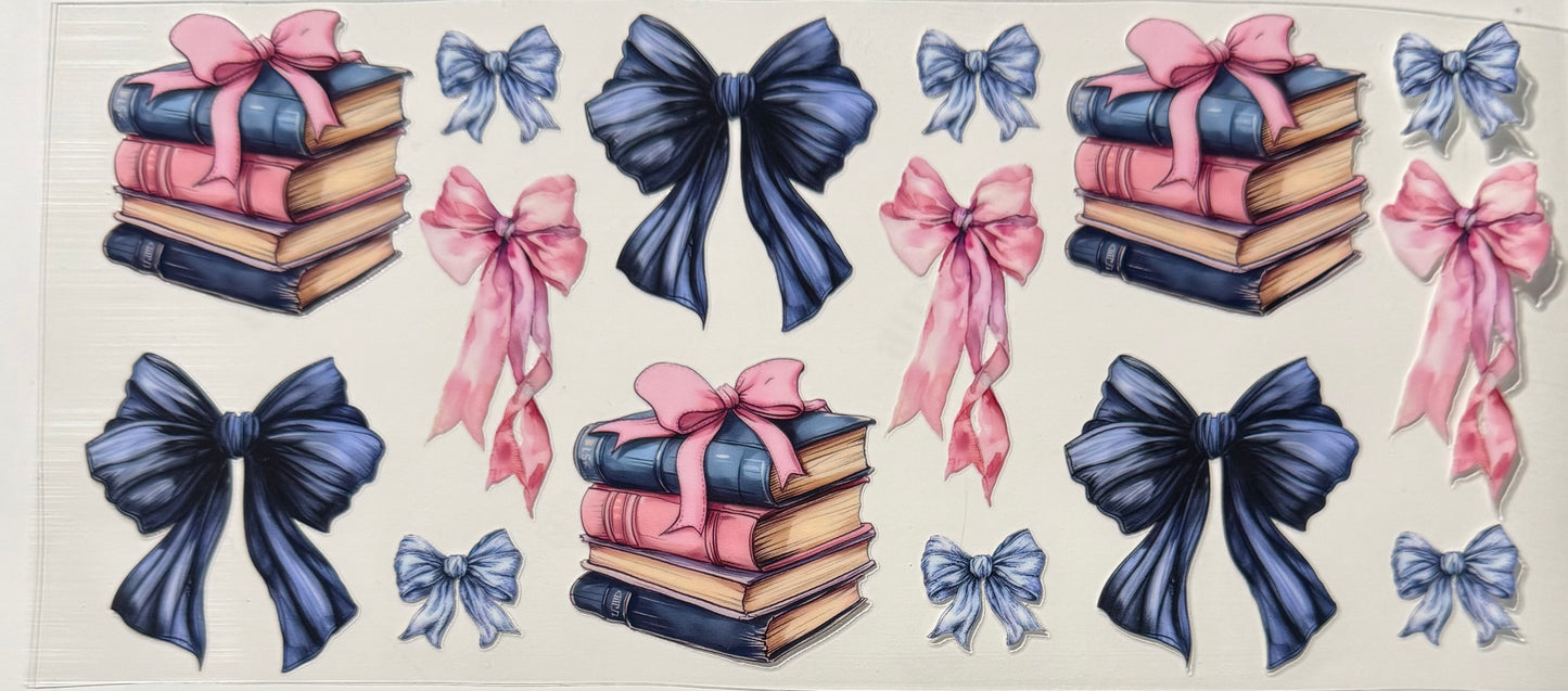 BOOKS WITH PINK AND BLUE BOWS