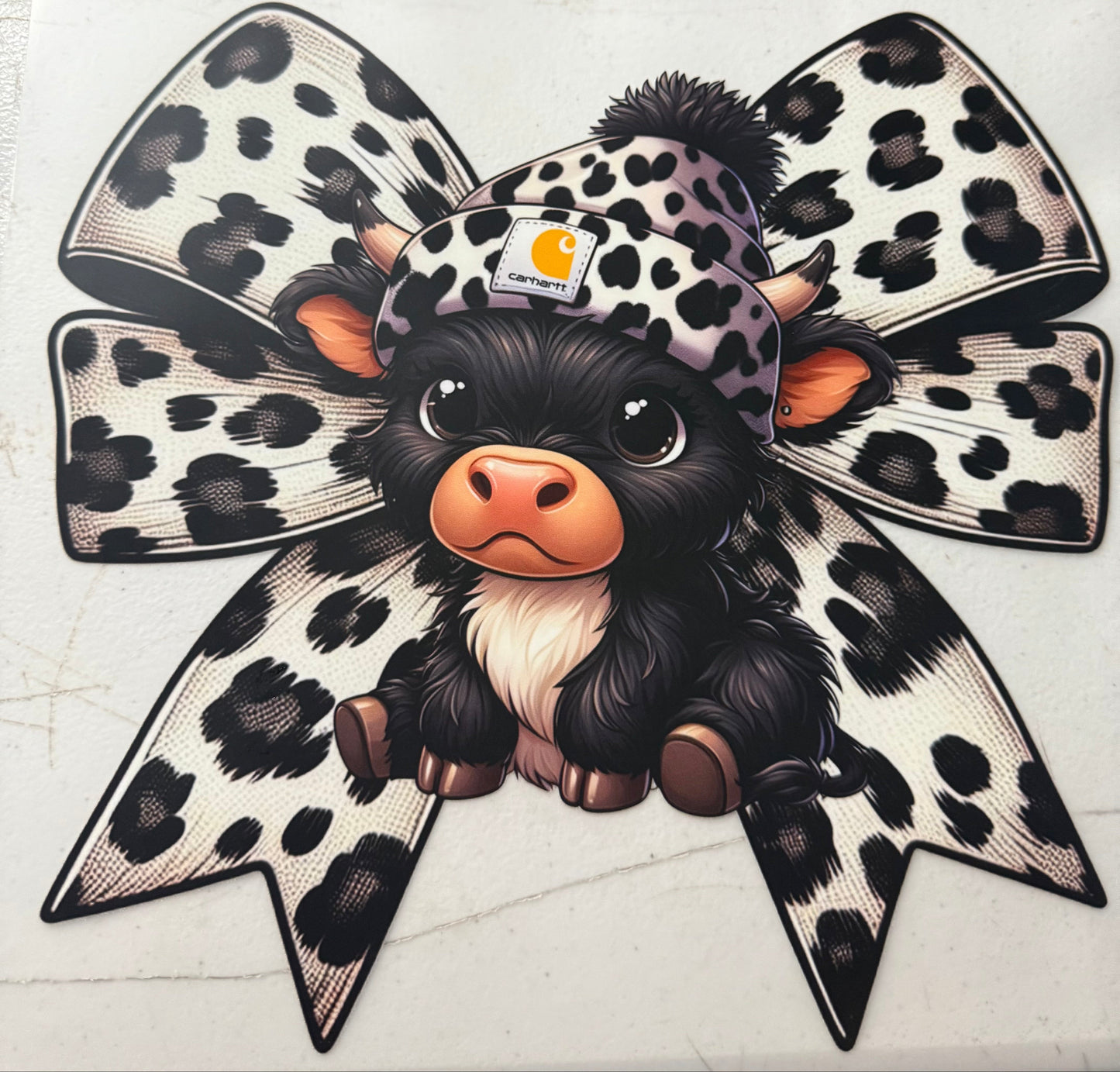 COW WITH LEOPARD BOW