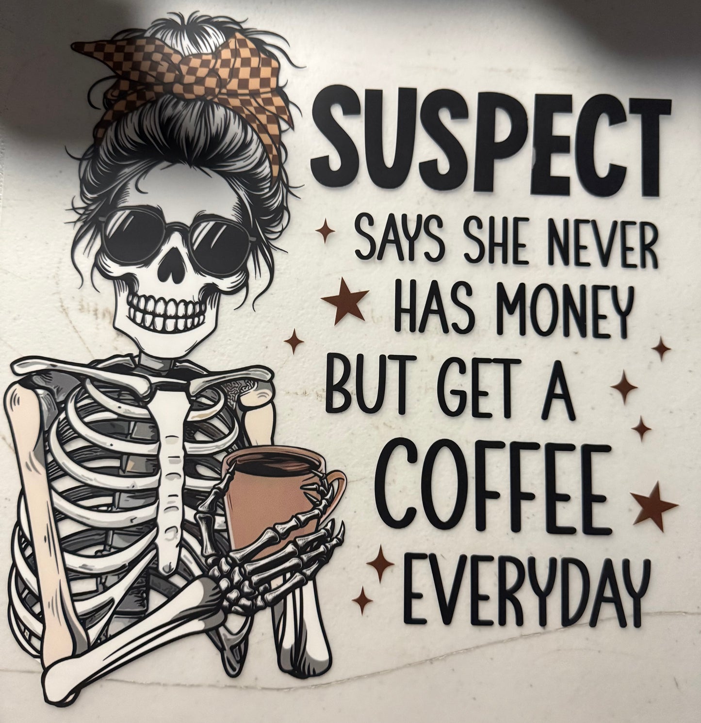 SUSPECT SAYS SHE NEVER HAS MONEY BUT GETS COFFEE EVERYDAY