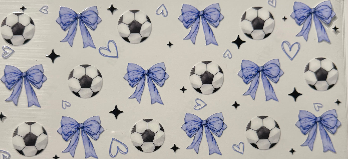 SOCCER BALLS AND BLUE BOWS