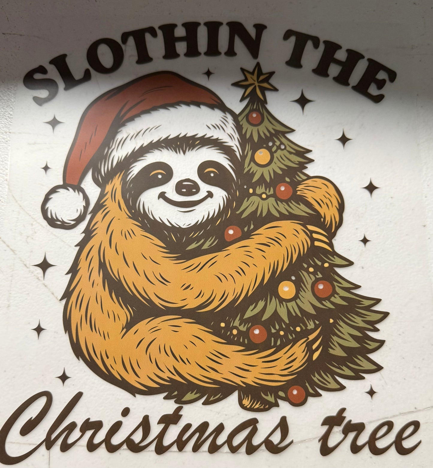 SLOTHING THE CHRISTMAS TREE