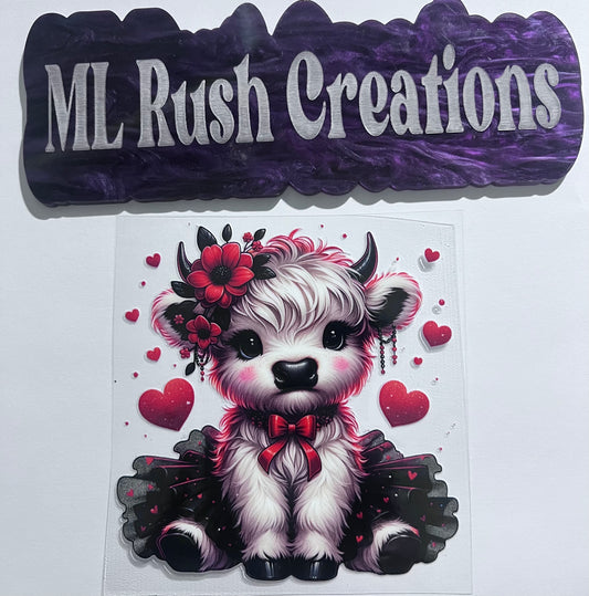 BLACK RED AND WHITE BABY COW