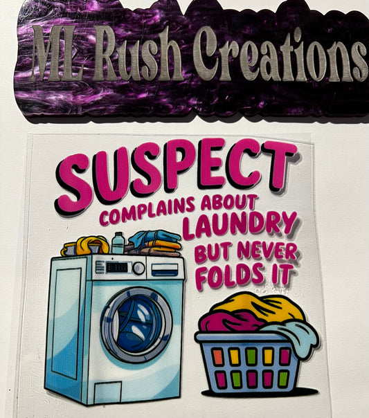 SUSPECT COMPLAINS LAUNDRY