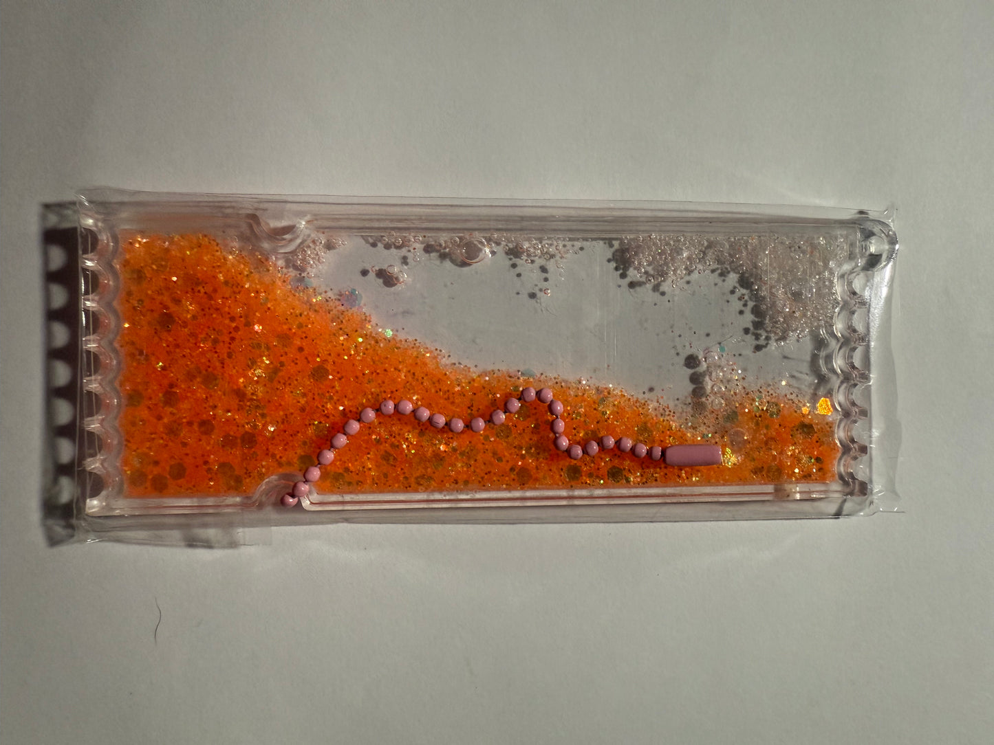 LIGHT ORANGE GLITTER BOOKMARK