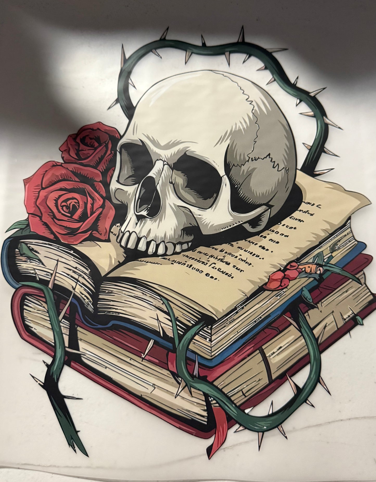 BOOKS WITH SKELETON ROSE
