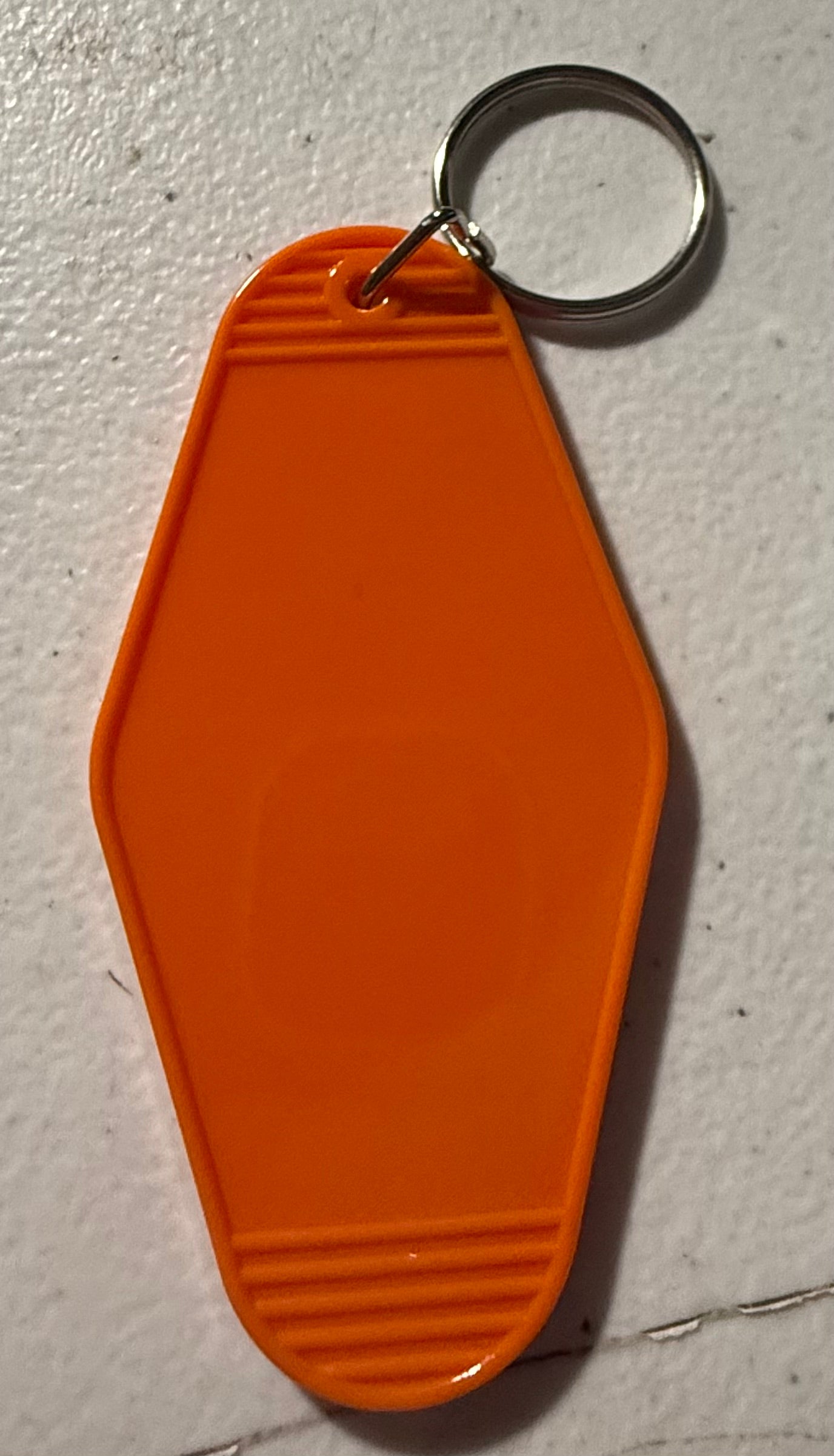 ORANGE MOTEL KEYCHAIN