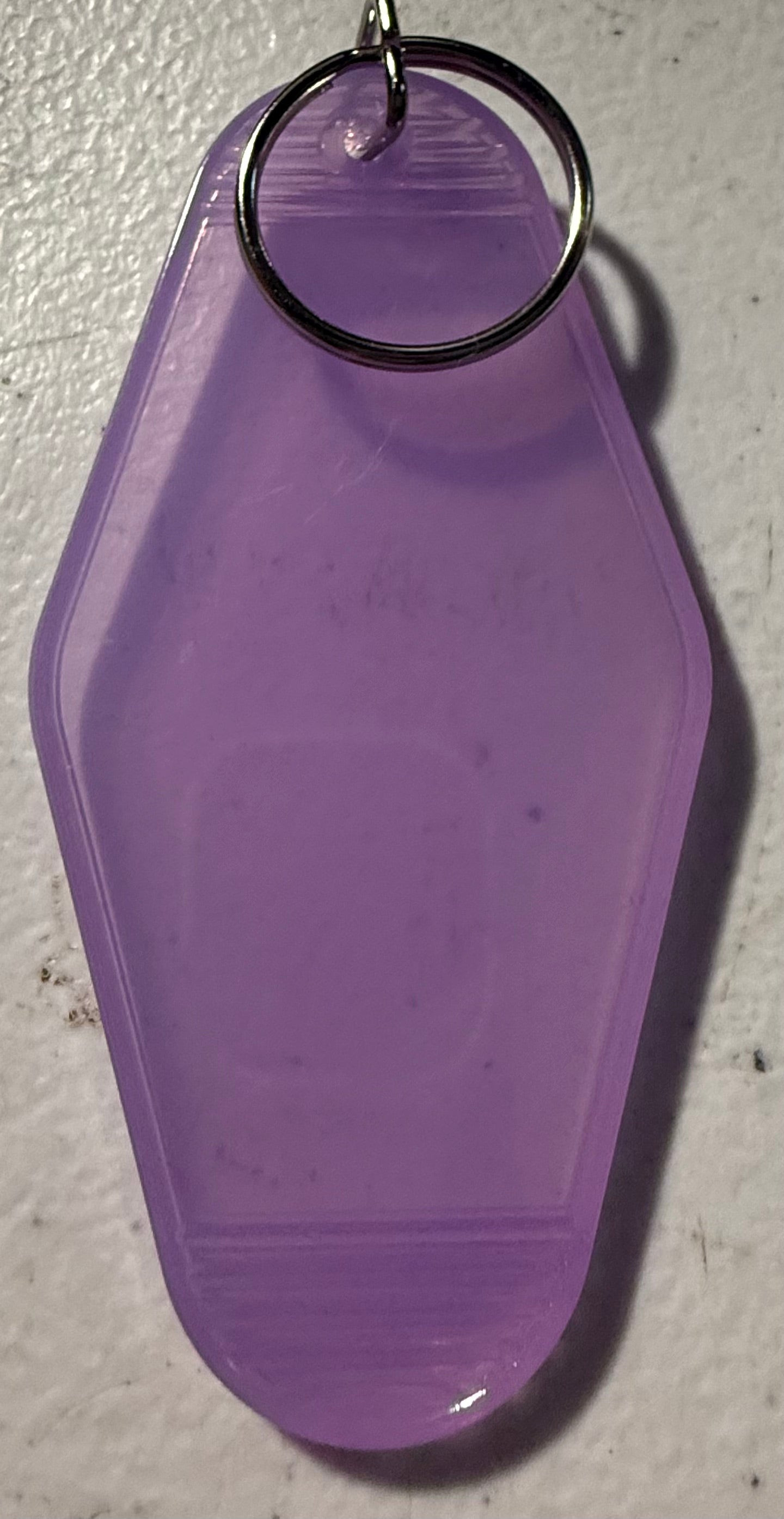 PURPLE MOTEL KEYCHAIN
